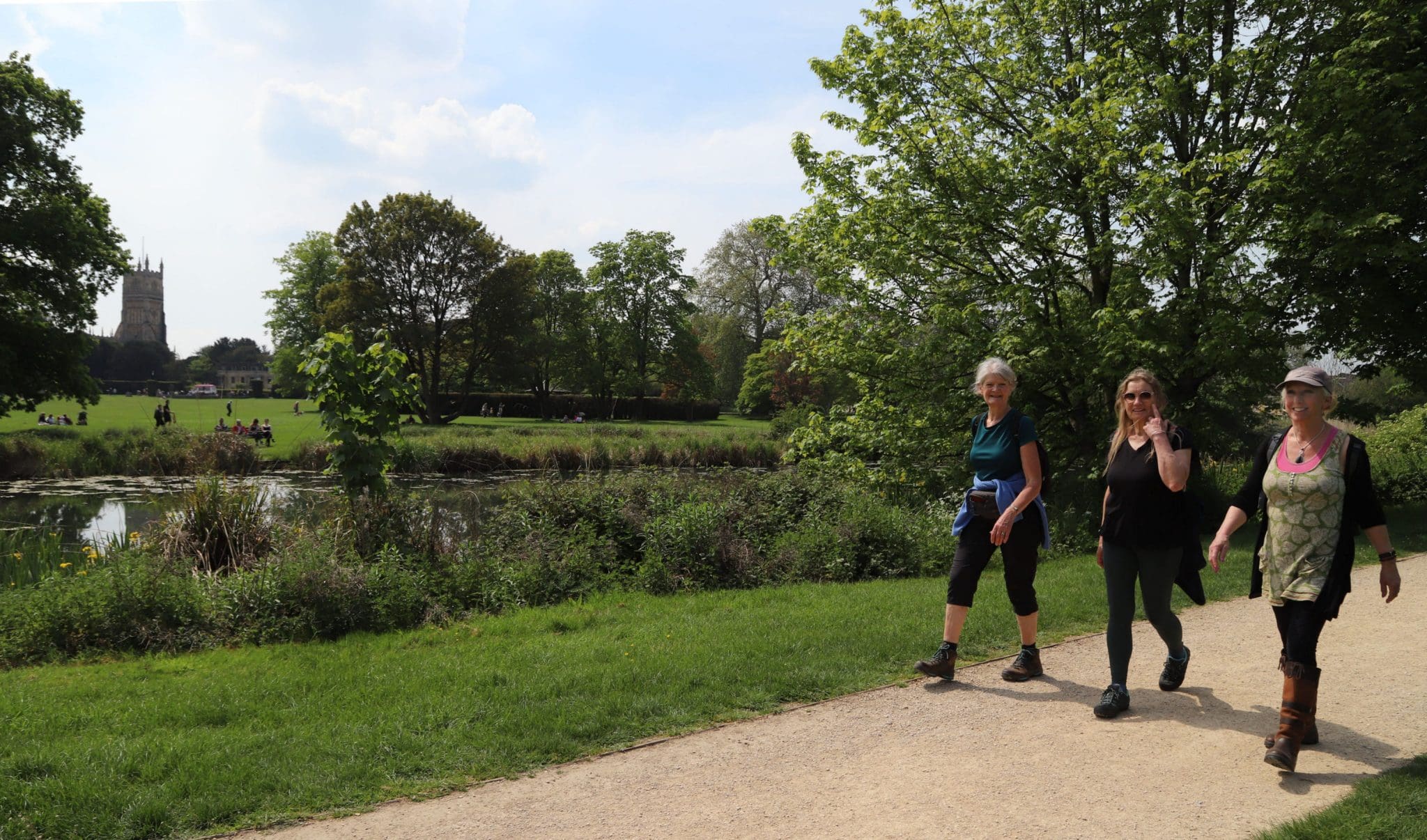 MP Roz Savage MBE walks with CEO Sarah Bourne and Fiona Reynolds DBE alongside Abbey Grounds lake